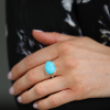 Oval Sleeping Beauty Turquoise Silver and Gold Ring
