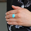 Oval Sleeping Beauty Turquoise Silver and Gold Ring