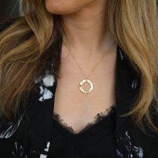Gold Circle Necklace with Unique Diamonds Image