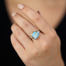 Asymmetrical Small Silver and Gold Boulder Opal Ring Image
