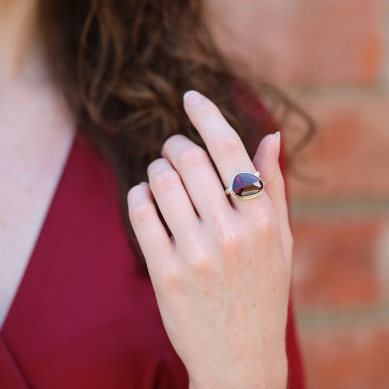 Asymmetrical Garnet Ring with Satellite Diamond