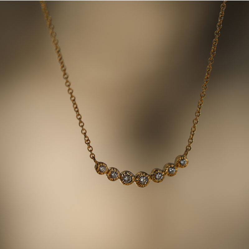 Curved Seven Diamond Bezel 18k Gold Necklace